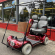 Scootmobiel gebruikt Shoprider Duo 2-zitter rood met overkapping